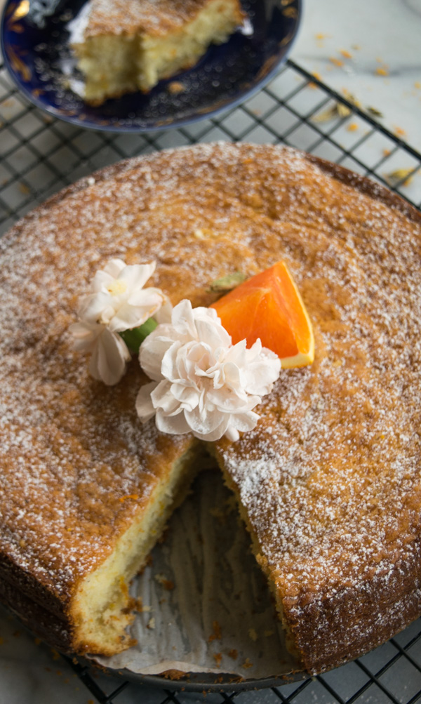 Almond cake with cardamom and orange--a delicate and moist cake bursting with flavors of orange and cardamom! |www.cookeatlaugh.com