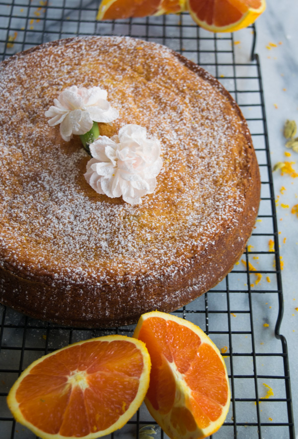 Almond cake with cardamom and orange--a delicate and moist cake bursting with flavors of orange and cardamom! |www.cookeatlaugh.com