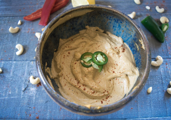 Killer three pepper cashew dip--This fiery cashew dip is blended with three different roasted peppers and makes for one flavorful dip! |www.cookeatlaugh.com