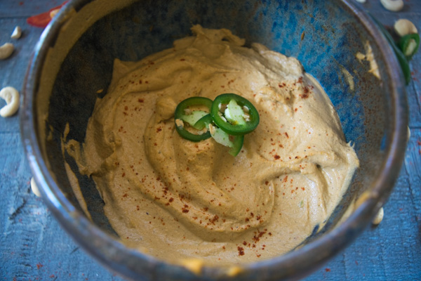 Killer three pepper cashew dip--This fiery cashew dip is blended with three different roasted peppers and makes for one flavorful dip! |www.cookeatlaugh.com