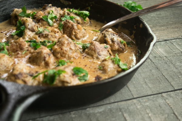 One pan meatballs with cashew cream sauce--a simple weeknight dinner which is packed full of flavor, easy to make, and delicious to eat! |www.cookeatlaugh.com