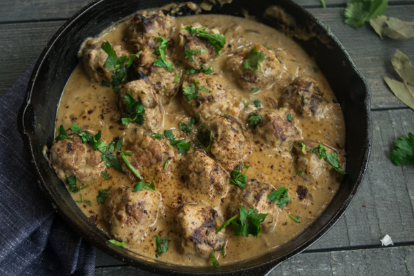 One pan meatballs with cashew cream sauce--a simple weeknight dinner which is packed full of flavor, easy to make, and delicious to eat! |www.cookeatlaugh.com