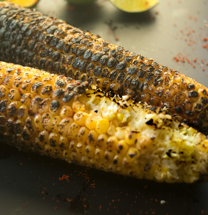 Grilled corn on the cob (Indian street style)--Simple, tangy, spicy, and salty grilled corn! |www.cookeatlaugh.com