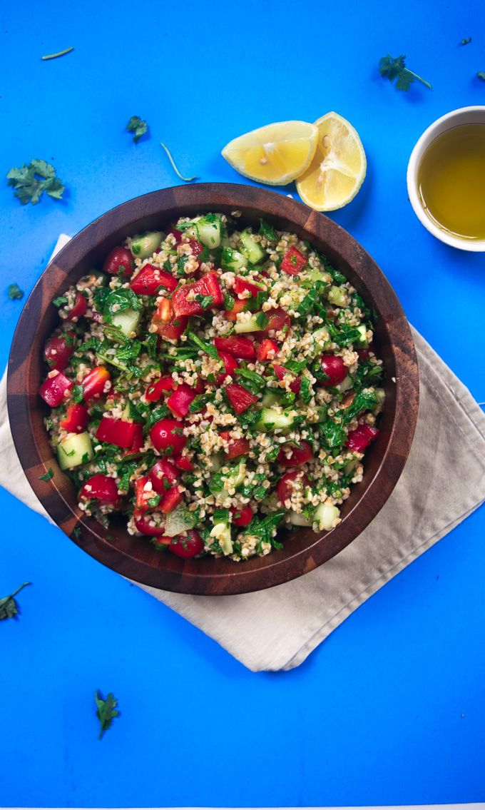 Mediterranean summer salad--nutritious salad filled with an array of vegetables, herbs, and tossed with a super simple dressing! |www.cookeatlaugh.com