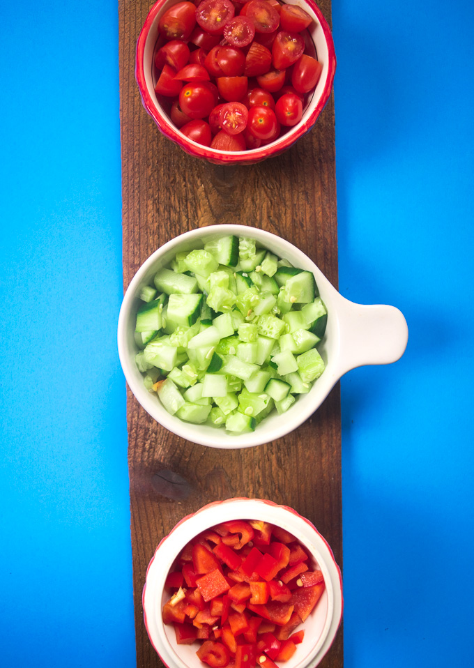 Mediterranean summer salad--nutritious salad filled with an array of vegetables, herbs, and tossed with a super simple dressing! |www.cookeatlaugh.com