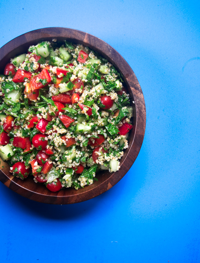 Mediterranean summer salad--nutritious salad filled with an array of vegetables, herbs, and tossed with a super simple dressing! |www.cookeatlaugh.com