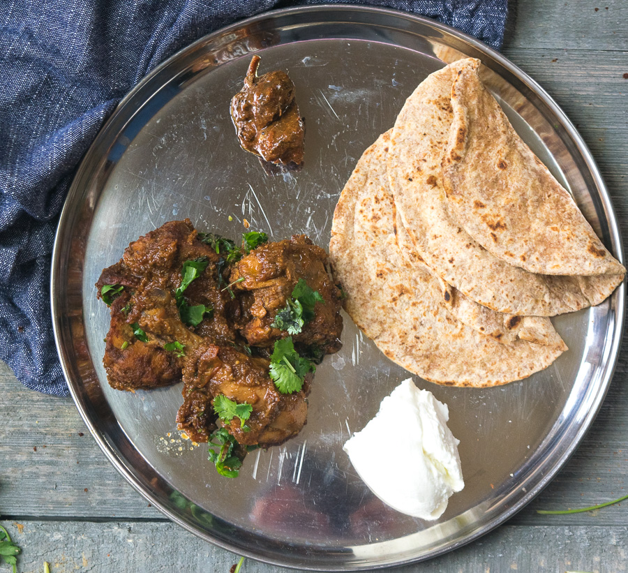 Mom's simple chicken curry-- this dish is filled with aromatic spices and will roughly take an hour to make and is not overly complicated! |www.cookeatlaugh.com