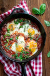 Eggs poached in fiery tomato sauce (eggs in purgatory)