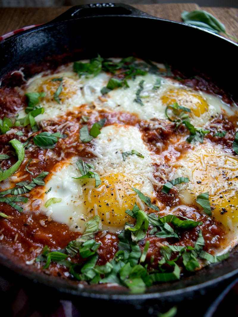 Eggs in purgatory-eggs are poached in a lip-smacking fiery tomato sauce that is meant to sopped up with a hunky slice of bread. |www.cookeatlaugh.com