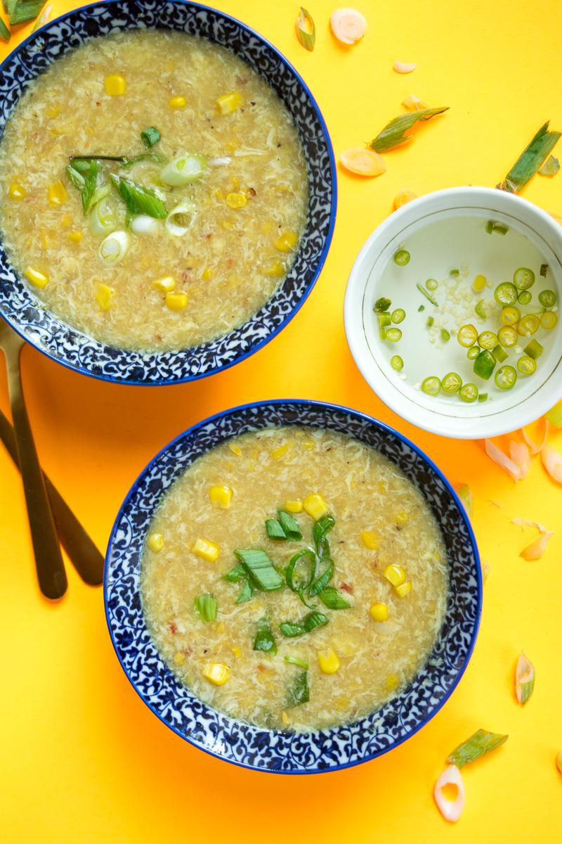 Indo chinese sweet corn soup with chili vinegar--a popular Indo Chinese soup which takes 20 minutes, one pot, and uses just a handful of ingredients.|www.cookeatlaugh.com