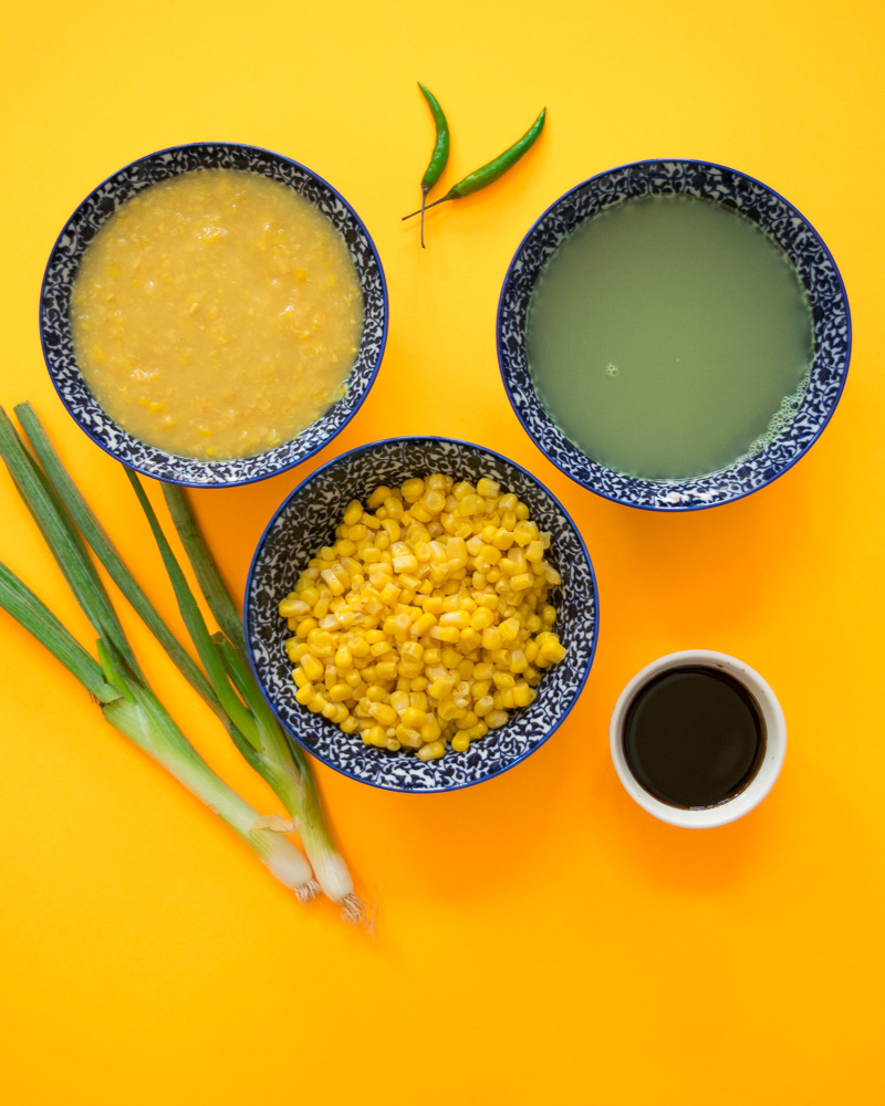 Indo chinese sweet corn soup with chili vinegar--a popular Indo Chinese soup which takes 20 minutes, one pot, and uses just a handful of ingredients.|www.cookeatlaugh.com