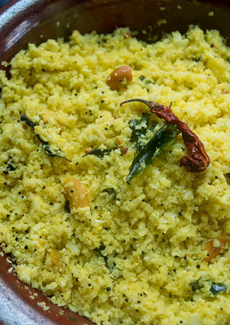 Quick 10-minute lemon cauliflower rice--Riced cauliflower tossed with aromatic Indian spices, so good you won't miss the rice! |www.cookeatlaugh.com