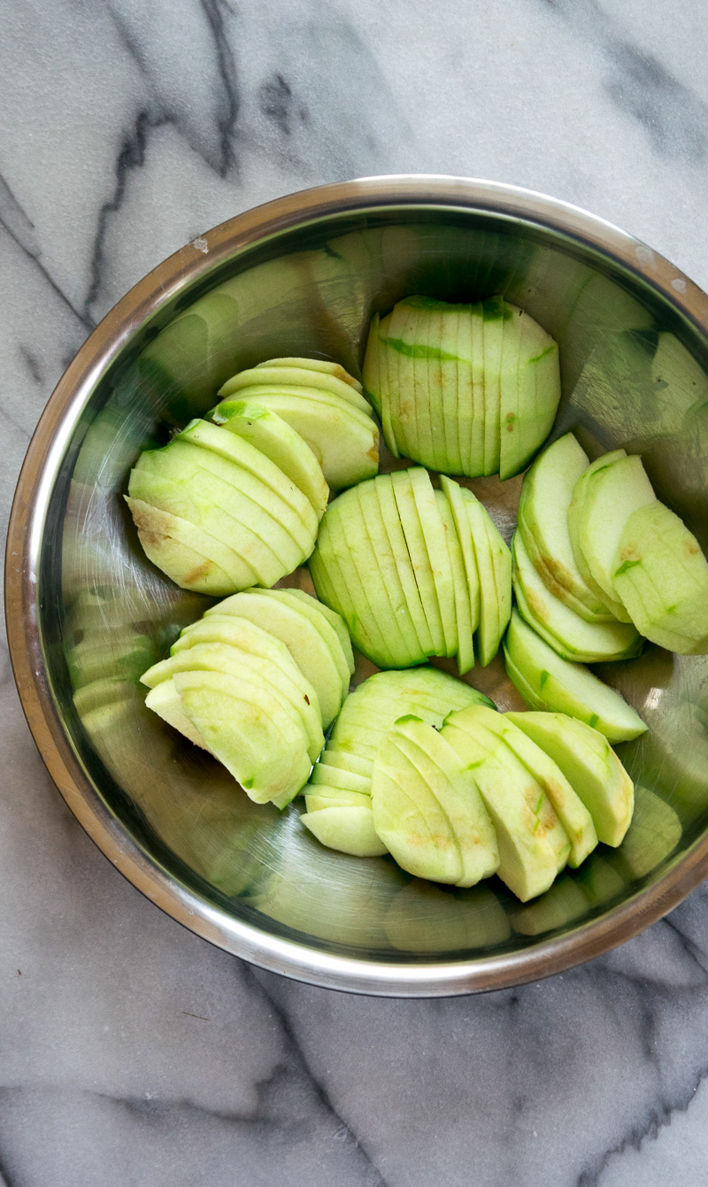 Rustic french style apple tart--a crispy crust, lightly sweetened apples, and butter. Super impressive, super delicious, and super easy to make. |www.cookeatlaugh.com