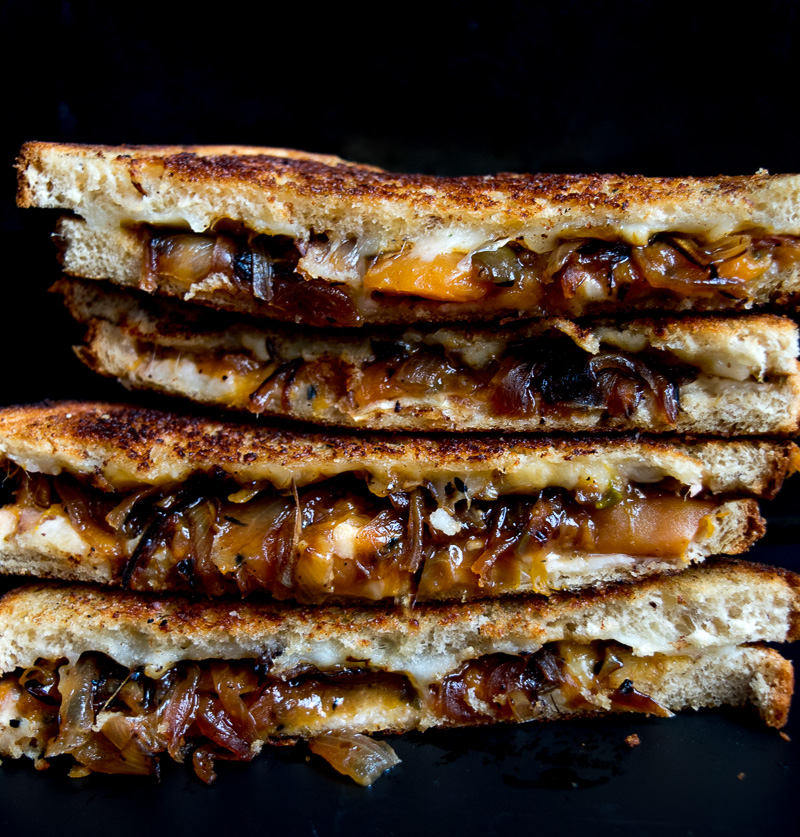 The ultimate sweet & savory grilled cheese--tangy sweet peach chutney and carmalized onions pairs perfectly with the ooey gooey melted cheese! |www.cookeatlaugh.com