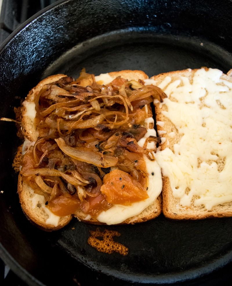 The ultimate sweet & savory grilled cheese--tangy sweet peach chutney and carmalized onions pairs perfectly with the ooey gooey melted cheese! |www.cookeatlaugh.com