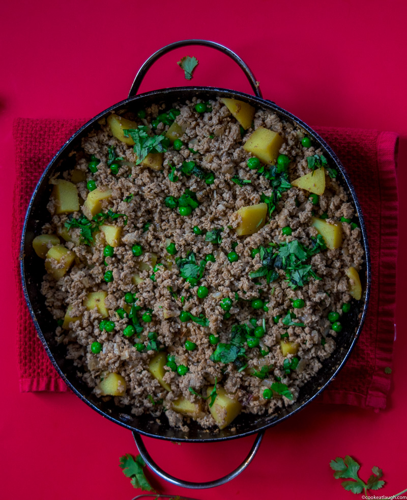 Aloo keema--a dish made of spiced and minced turkey, simmered with potatoes and peas! |www.cookeatlaugh.com