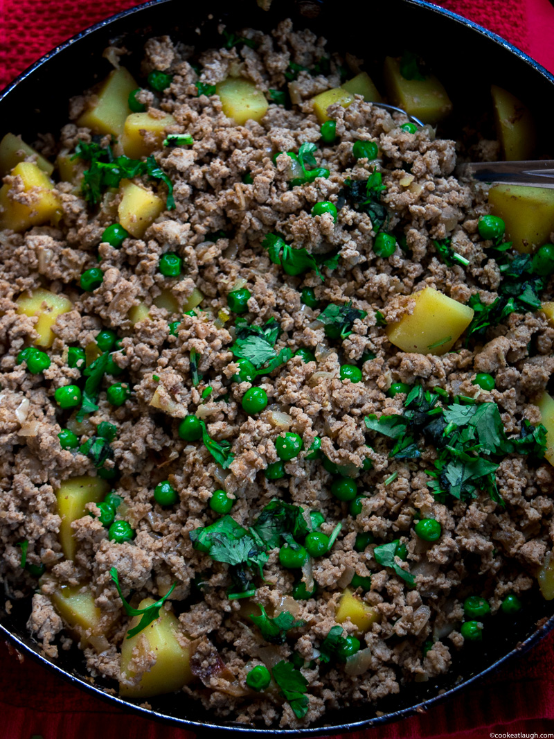 Aloo keema--a dish made of spiced and minced turkey, simmered with potatoes and peas! |www.cookeatlaugh.com