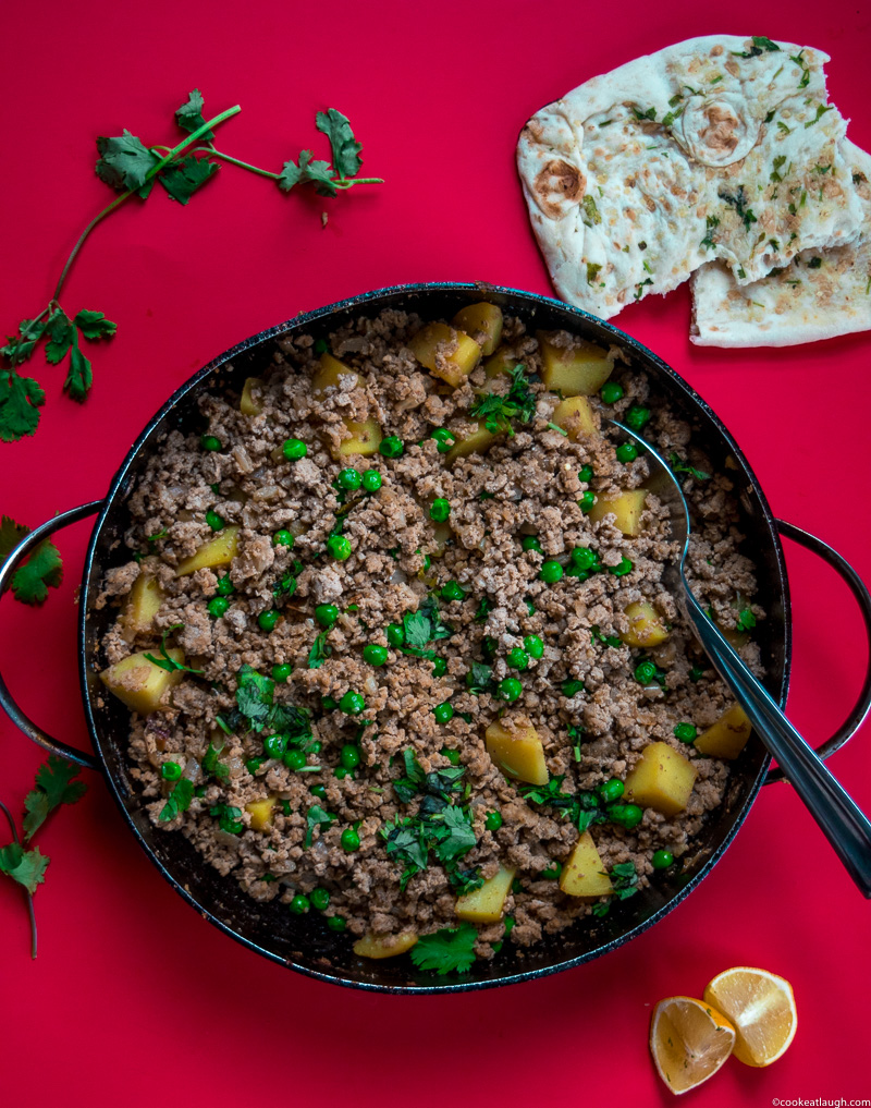 Aloo keema--a dish made of spiced and minced turkey, simmered with potatoes and peas! |www.cookeatlaugh.com