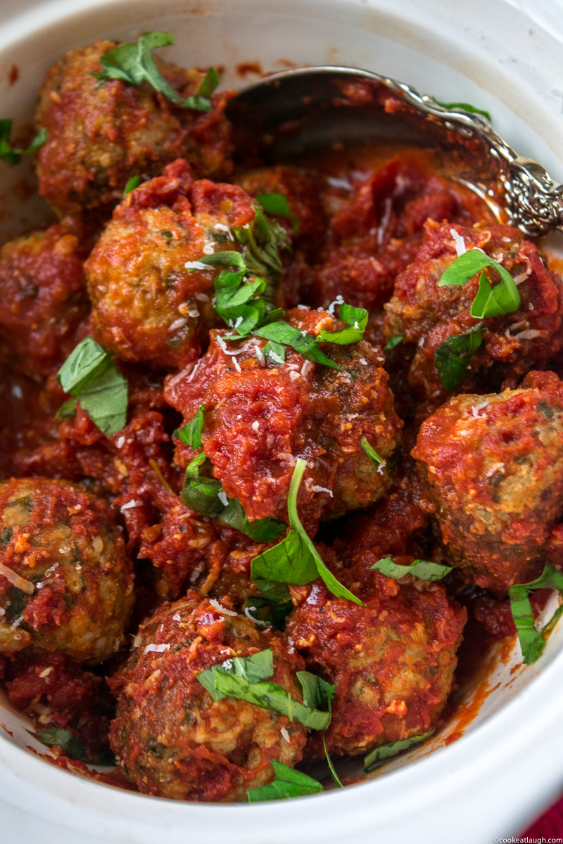 Spicy turkey meatballs in tomato sauce--it takes roughly 30 minutes to make and are super flavorful and juicy simmered in a simple tomato sauce! |www.cookeatlaugh.com -11