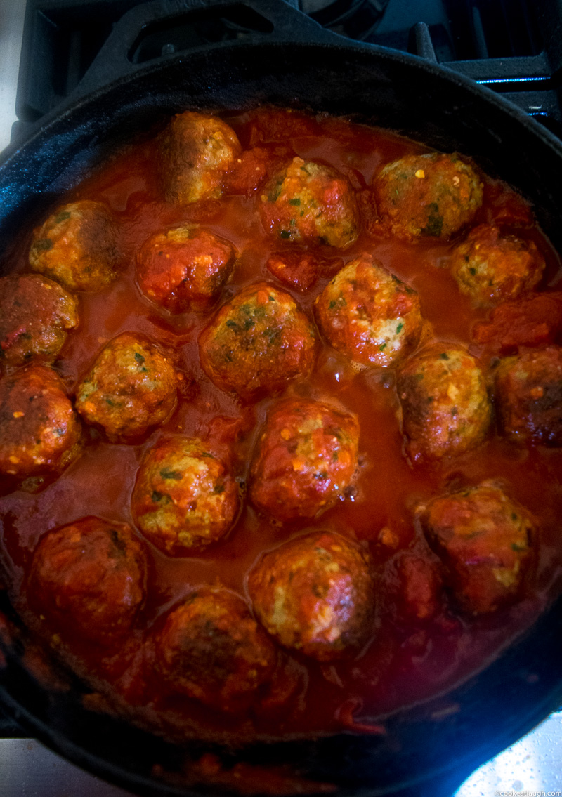 Spicy turkey meatballs in tomato sauce--it takes roughly 30 minutes to make and are super flavorful and juicy simmered in a simple tomato sauce! |www.cookeatlaugh.com -3