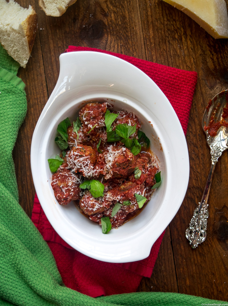 Spicy turkey meatballs in tomato sauce--it takes roughly 30 minutes to make and are super flavorful and juicy simmered in a simple tomato sauce! |www.cookeatlaugh.com -4