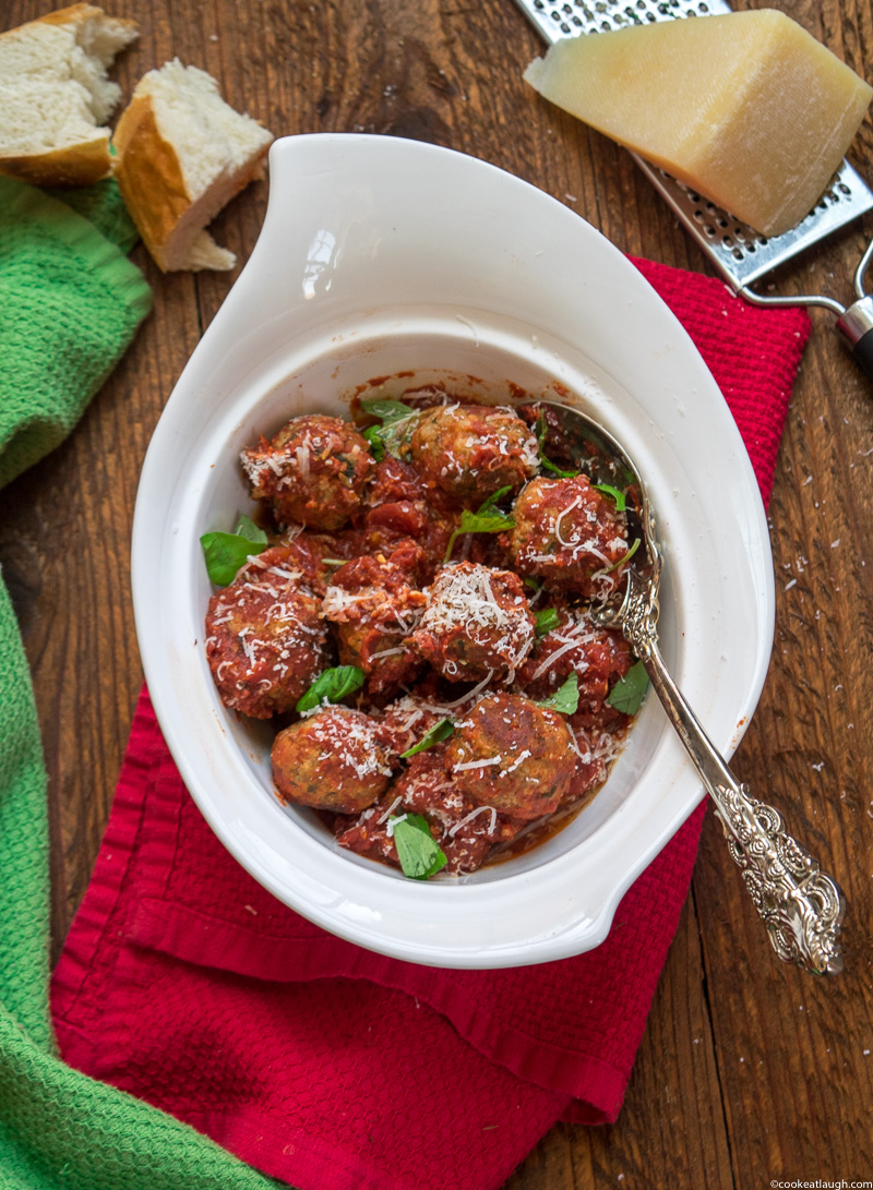 Spicy turkey meatballs in tomato sauce--it takes roughly 30 minutes to make and are super flavorful and juicy simmered in a simple tomato sauce! |www.cookeatlaugh.com -6