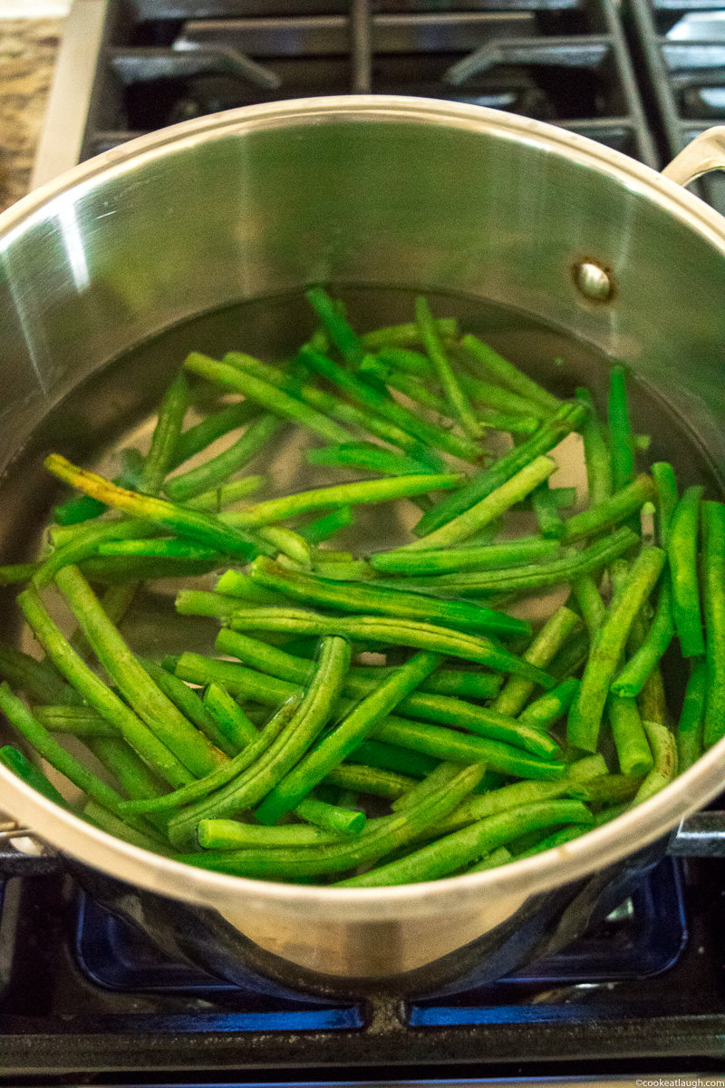 Sautéed green beans with toasted almonds—a simple elegant dish that will make a great side on your holiday table or for Sunday dinner. |www.cookeatlaugh.com--2