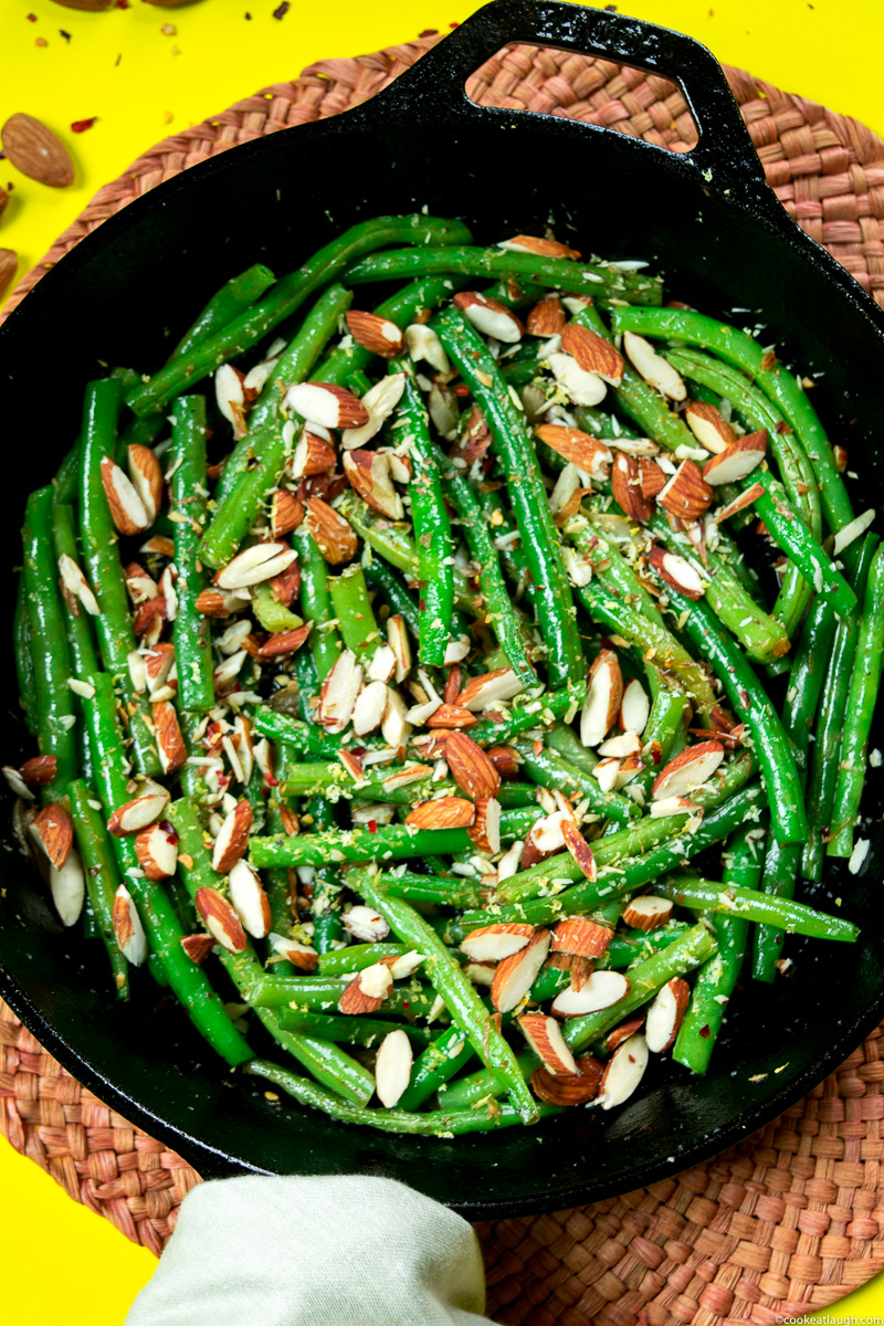 Sautéed green beans with toasted almonds—a simple elegant dish that will make a great side on your holiday table or for Sunday dinner. |www.cookeatlaugh.com--6